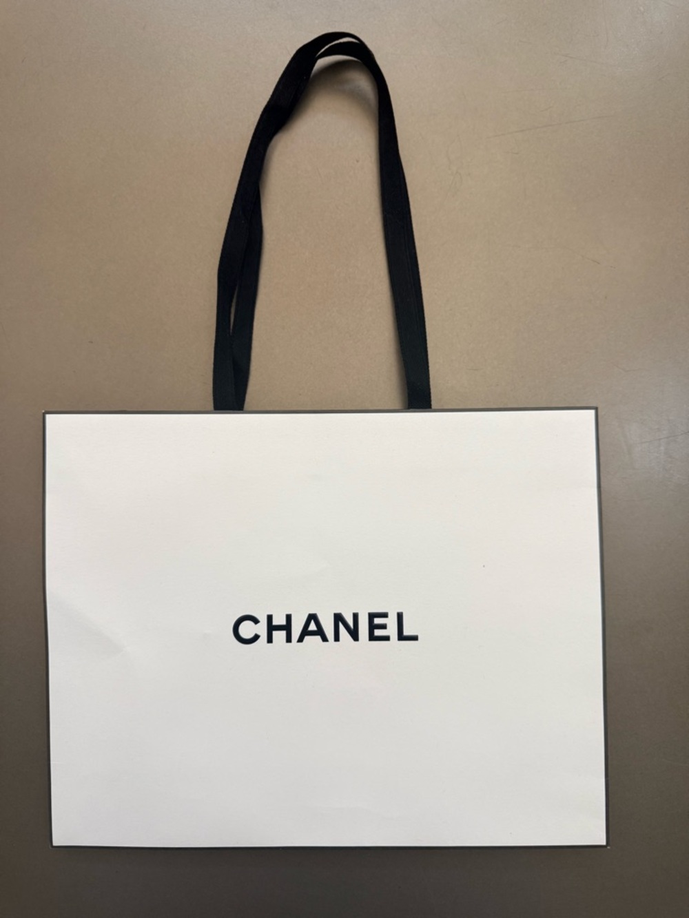 CHANEL White Paper Tote with Black Logo and Ribbon Handles - Shopping Bag